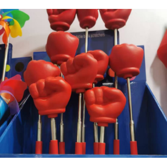 Extendable massage fist