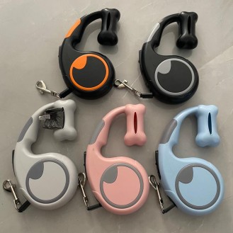 Pet leash with garbage bag holder